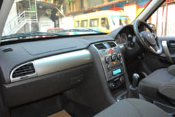 The dashboard now features an all-black theme with silver inserts. The centre console retains the circular AC switches on the top but now comes with a silver finish. A touchscreen infotainment system is still not on offer. 
