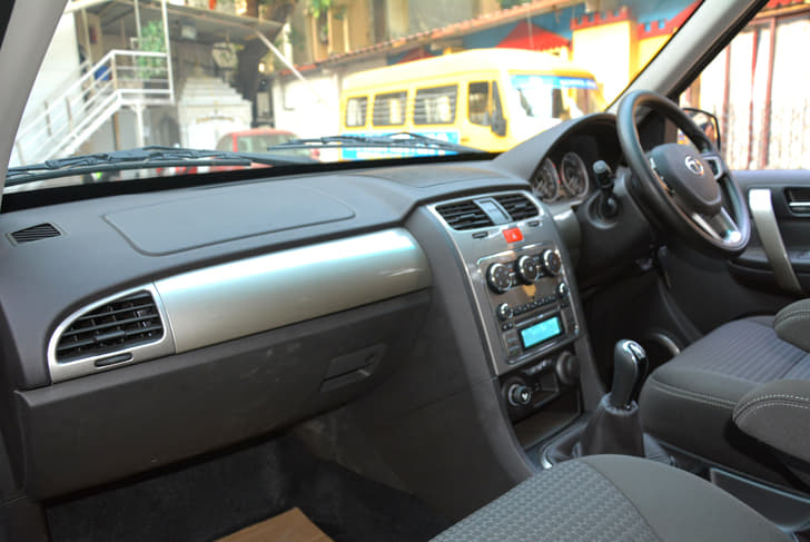 The dashboard now features an all-black theme with silver inserts. The centre console retains the circular AC switches on the top but now comes with a silver finish. A touchscreen infotainment system is still not on offer.