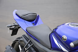 The Yamaha’s split saddle is plush enough but seats the rider with a slightly forward stance.