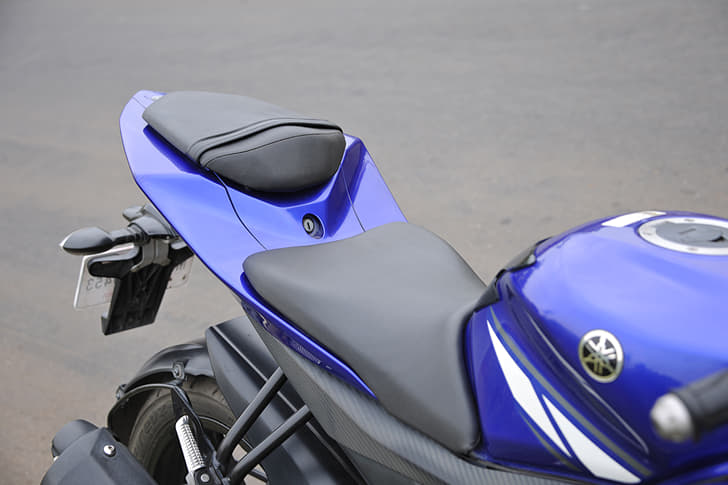 The Yamaha’s split saddle is plush enough but seats the rider with a slightly forward stance.