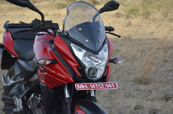 The really tall and see-through visor on the Bajaj Pulsar AS 150; a potent projector headlight illuminates the roads well at night.