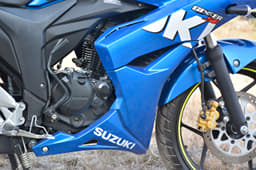 155cc, single-cylinder and air-cooled engine pulls away from low down in its powerband, power tapers off rather quickly toward the top end. 