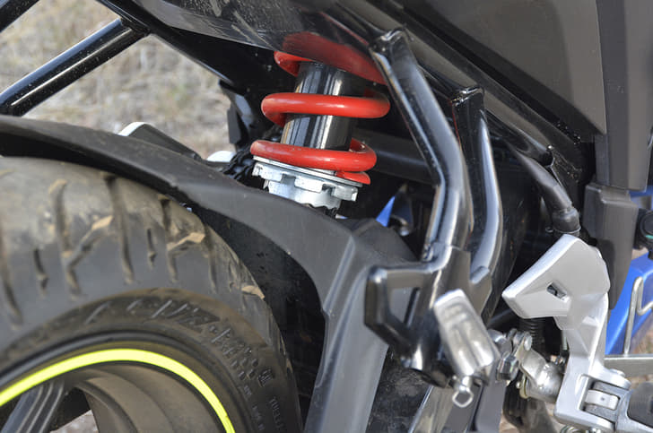 Non-adjustable monoshock at rear, feels well thought out on the Suzuki. 