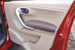 The doors have soft, cushioned arm rests and grab handles that look nice.