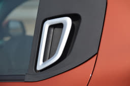 The rear door handles come mounted on the C-pillar. Only the top-end variant gets them finished in silver though.