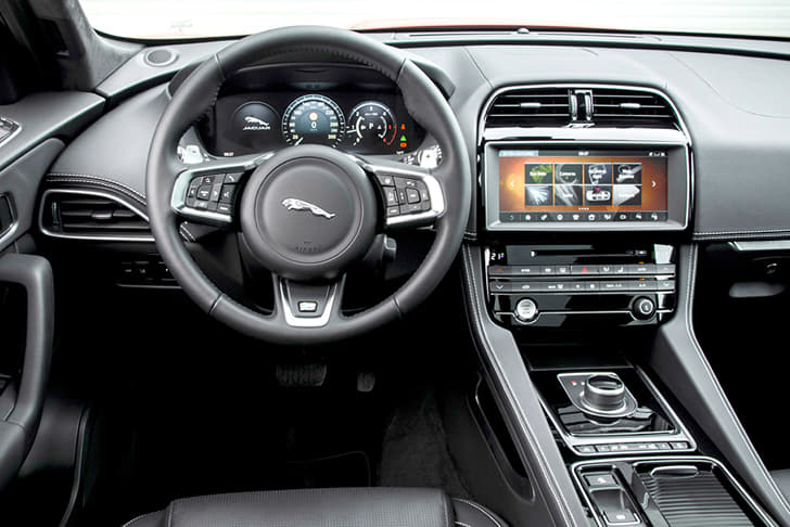 The interior is simple and well appointed with the use of leather and plastic that feel top notch.