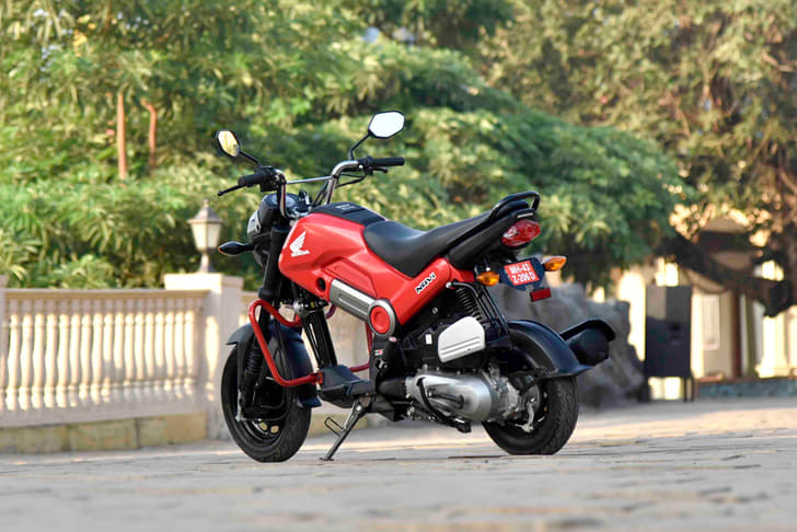 The upright motorcycle-like stance and rear-positioned scooter engine is what makes the Navi defy conventional motorcycle dynamics.