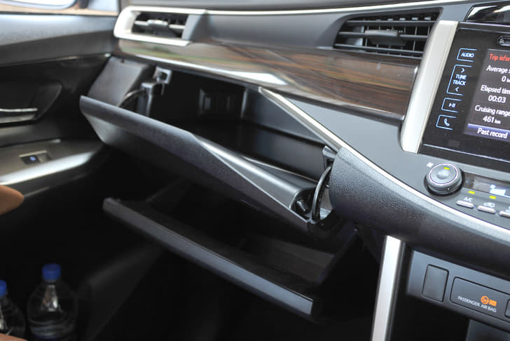 There are two gloveboxes, of which one is cooled, but neither is very large; one large one might have been better.