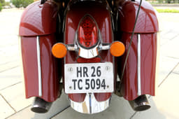 Storage options include hard panniers on either side.