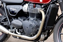 Nestled in the Triumph Street Twin’s dual-cradle frame is an all-new 8-valve, 900cc parallel twin motor that now gets liquid cooling.