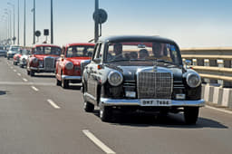 The Mercedes-Benz W120 Ponton 190 and its beaming owners in Sunday’s rally.