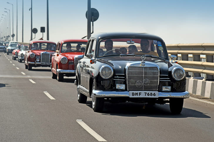 The Mercedes-Benz W120 Ponton 190 and its beaming owners in Sunday’s rally.