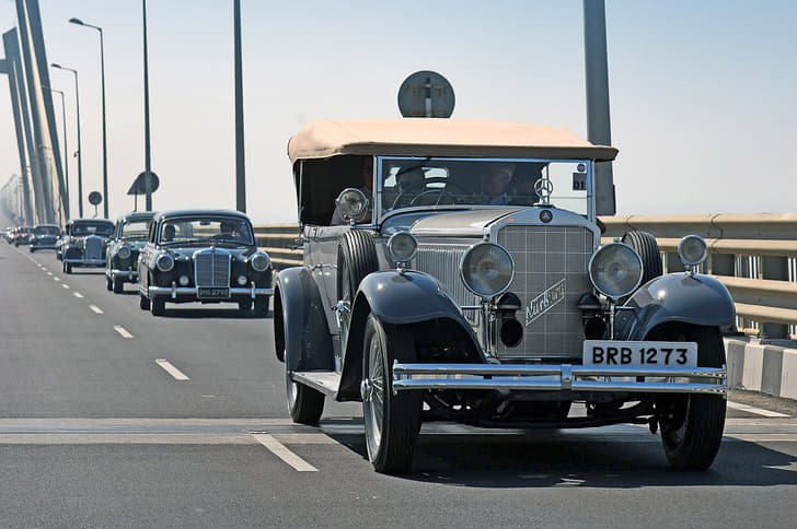 Classic cars and modern bridges make for beautiful drives. 