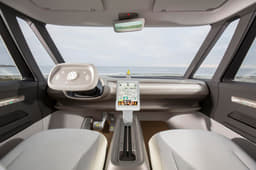 The concept features a retractable, touch sensitive steering wheel.