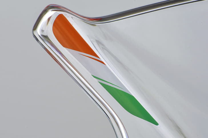 The Indian tricolour is subtly displayed on the windscreen. A great touch.