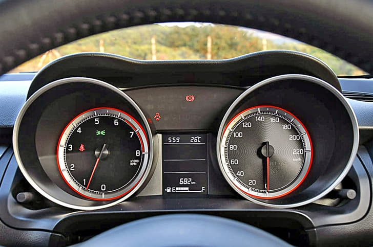 Hooded dials get sleek detailing in red. 