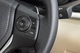 Chunky buttons on the steering wheel easy to use on the move.