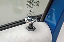 Monogrammed door locks are a cool touch.