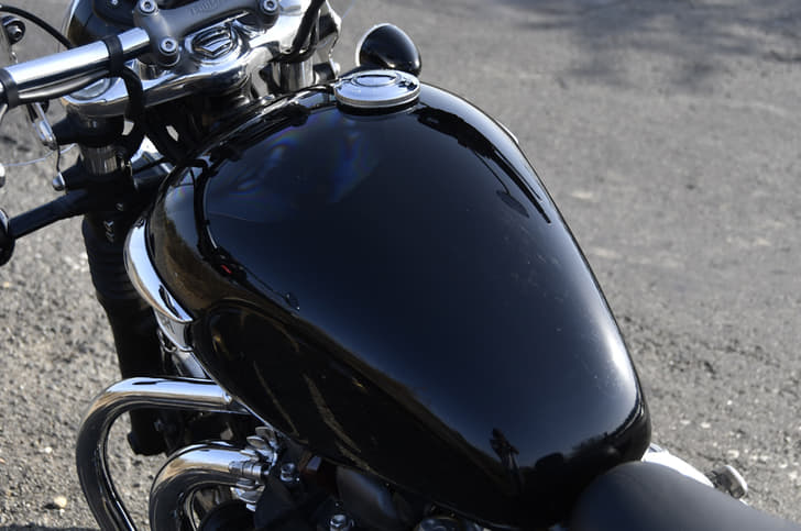 The Bonneville-sourced 12-litre fuel tank offers decent range.