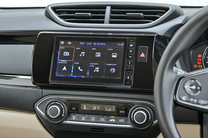 Touchscreen is slick, but buttons are a bit small and fiddly to use.