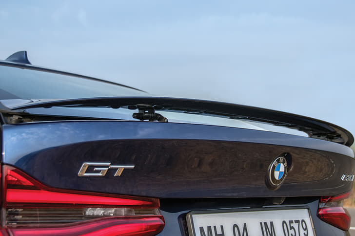 Rear spoiler rises automatically above 120kph, lowers under 80kph.