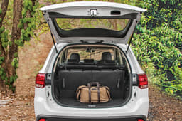 With the third row up, you can fit in a few soft bags; loading lip is low enough too.