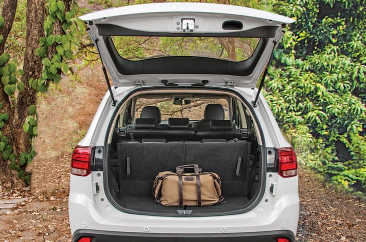 With the third row up, you can fit in a few soft bags; loading lip is low enough too.