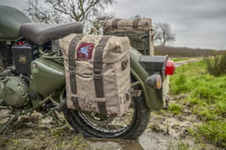Adding to the period look are the military-style canvas panniers.