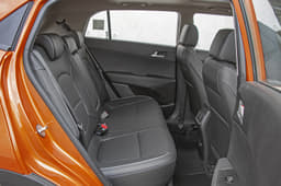 There's lots of space in the back, but you sit a bit low. 