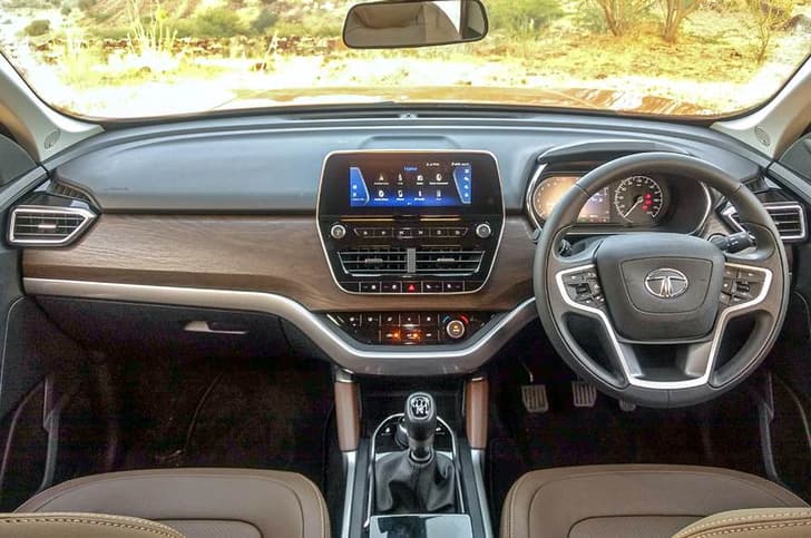 Dual-tone dashboard gets chrome highlights.