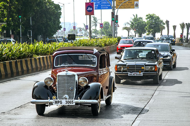 A rare 170V cabriolet tailed by a W123 sedan.