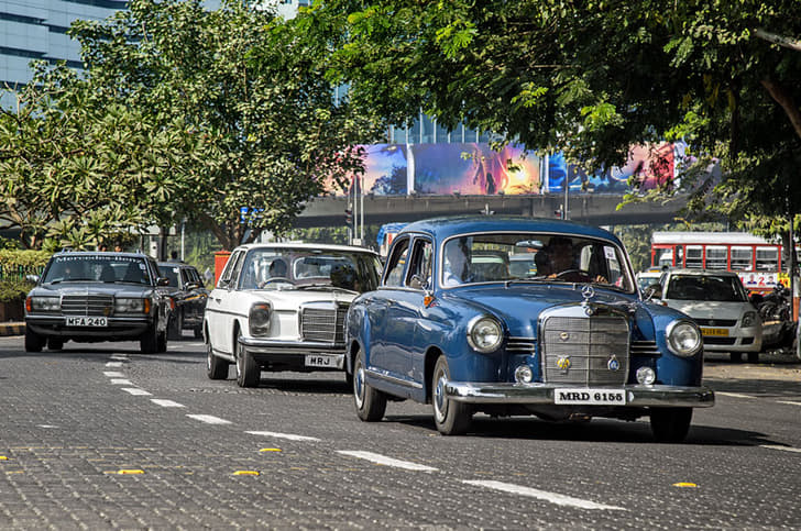 The Mercedes-Benz Ponton leads a convoy of E-Classes.