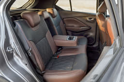 Rear seat AC and armrest available even with Kicks' base XL variant.