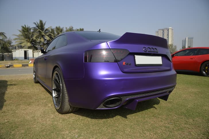 Now that's a wrap! This Audi RS5 in a deep purple wrap looks sleek.