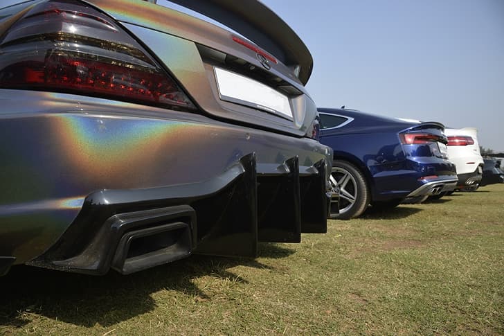 Diffusing the situation. An Audi S5 is flanked by two Mercs.