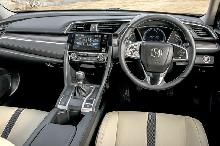 Sporty, yet luxurious interiors.