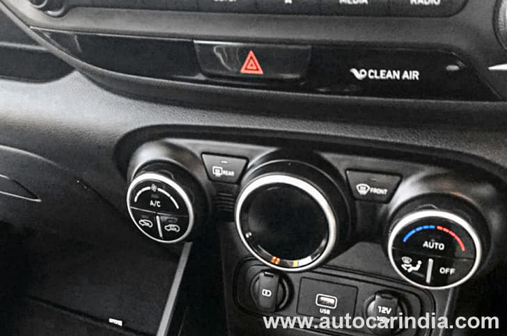 Chunky climate control switches.