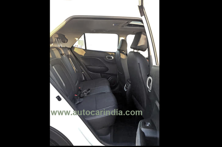 Rear seats get adjustable neck restraints for three passengers.