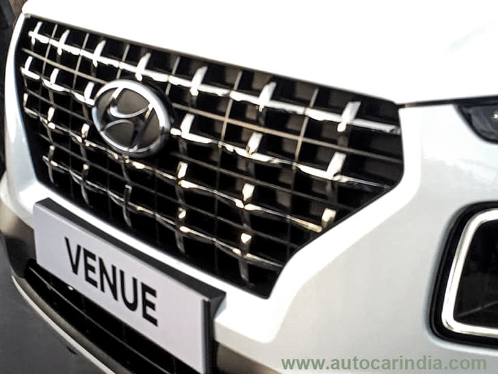 Hyundai's cascading grille design is prominent.