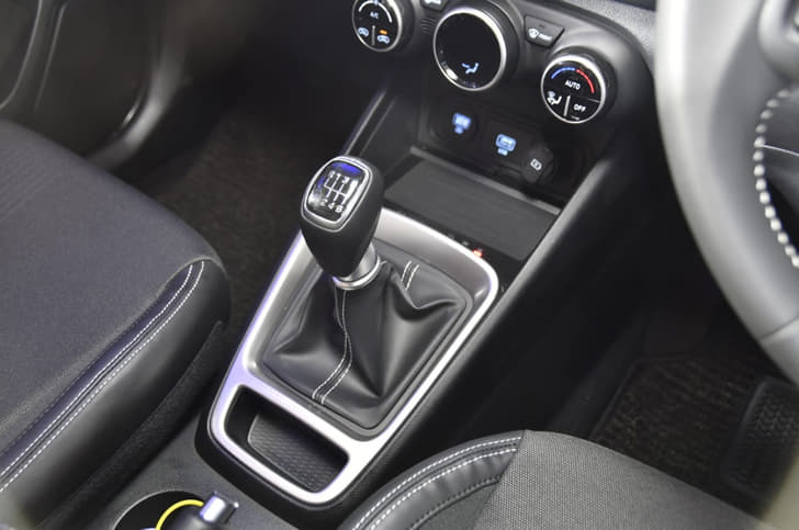 Gear lever gets upmarket silver surround.