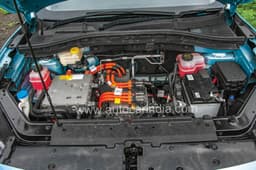 Orange wires are high-tension, do not touch; Tap the accelerator in ‘Sport’ and the response is both strong and instant.