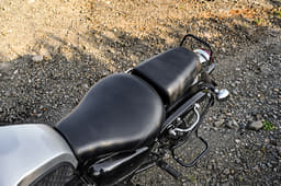 The retro bike uses a split seat layout, with the front one being sprung.