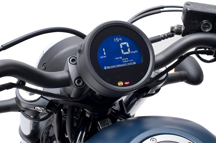 The updated instrument cluster displays gear position and fuel level.