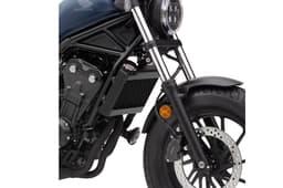 The front fork features stiffer springs and different oil levels.