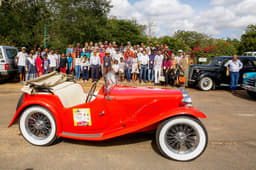The members and guests pose at the resort.
