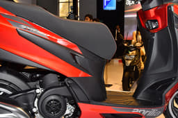 A large seat and long footboard are indicators of the maxi-scooter like styling.