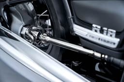 The exposed shaft drive linkage on the R18 cruiser.