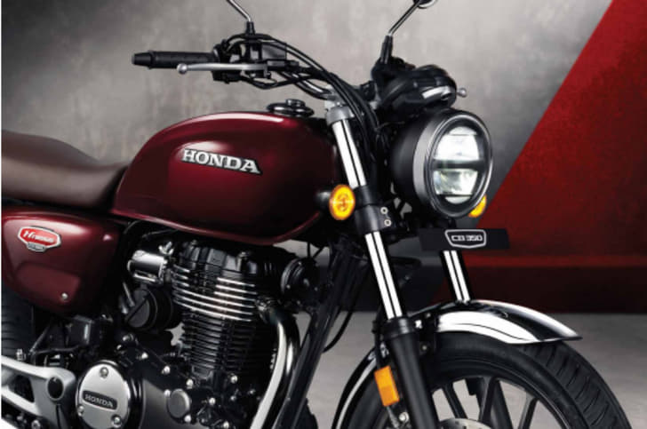 The H'ness CB350 features retro styling with its simple-looking tank and round headlight.