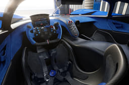 The interior is driver-centric, with a single screen in the cabin - the digital instrument cluster.