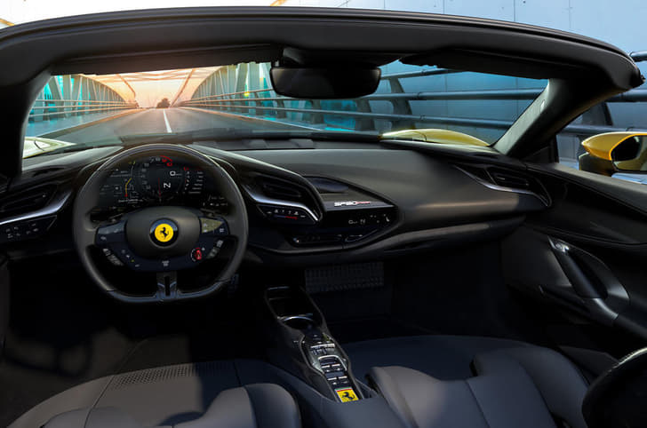 Cabin is identical to that of the coupe; gets a 16-inch digital display. 